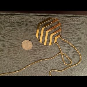 Trina Turk golden geo necklace about 30” drop.